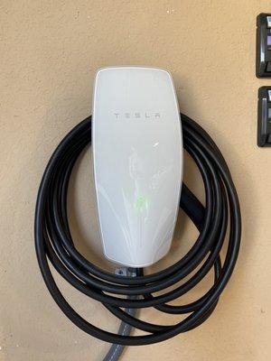 One of two Tesla chargers installed.