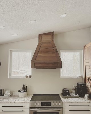 Custom walnut hood.