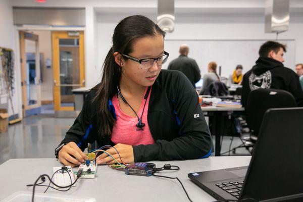 An Olin student works on a circuit during a class in 2017.