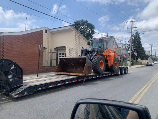 Transporting one of our Doosan DL300 to a drainage job in New Jersey.