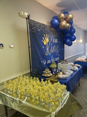 Entry wall on the right side of the door. Long enough for 3 of their large tables with space. We used this wall for food and deserts