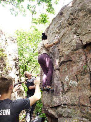 Rock climbing outdoors with friends! We have classes to help teach you technique.