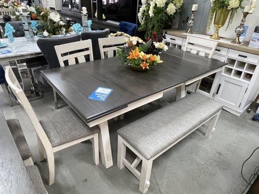 Dining Table includes tables with 4 chairs and 1 bench. $1,100