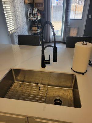 New kitchen sink faucet