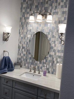 Backsplash of one bathroom