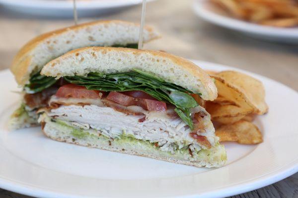 Our in-café offerings feature local breads, house-made chips, house-roasted proteins and veggies sliced by hand.