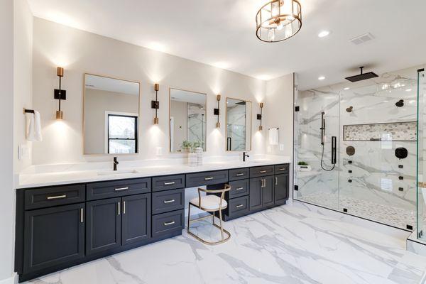 MCKB Mclean remodel: Classic Charcoal Cabinets paired with gold hardware. Calacatta Lincoln quartz countertops.