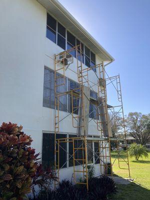 Scaffolding set up for patio window conversion