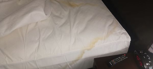 Urine stained mattress. Absolutely disgusting. And that is where you lay your head