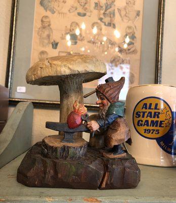 Hand carved mushroom and gnome in the shop.