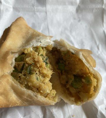 Samosa showing veggie insides