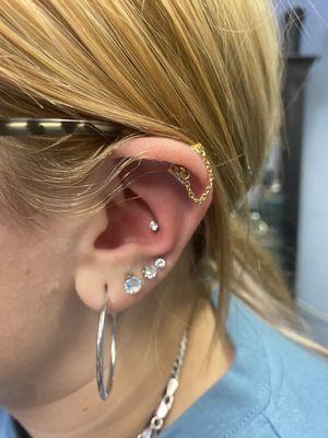 Conch piercing on left ear