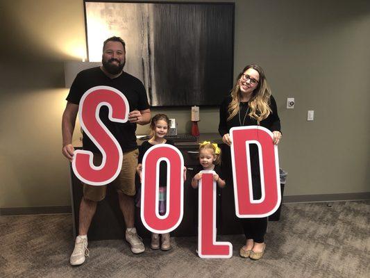 Just sold! Happy homebuyers