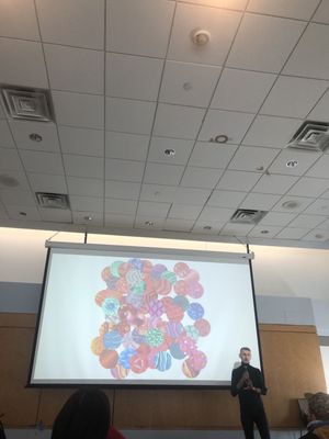 Ceiling , lights, and colorful pattern on screen