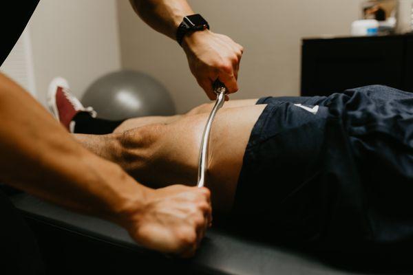 Instrument assisted soft tissue mobilization to help increase blood flow and speed recovery