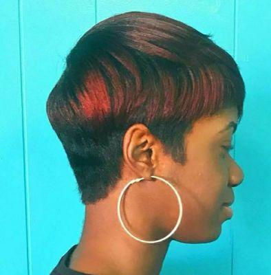 Short pixie cut with colored highlights