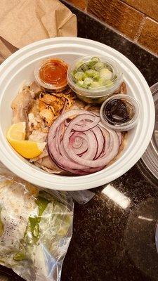 Bowl with phó noodles and garnishes