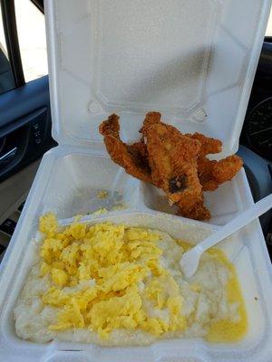 Amazing fish & grits w/cheese! Butter is under the grits, so when you start stirring... ! Yum! Fish is fried and seasoned to perfection!