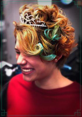 Peek-a-boo turquoise highlights, then curled and styled with updo in back and tiara mounted in front for clients photo shoot