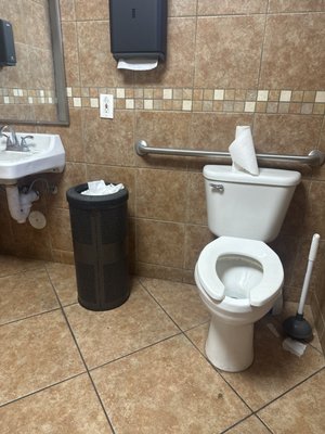 Customer restroom- no working sink to wash hands- filthy toilet and floors.