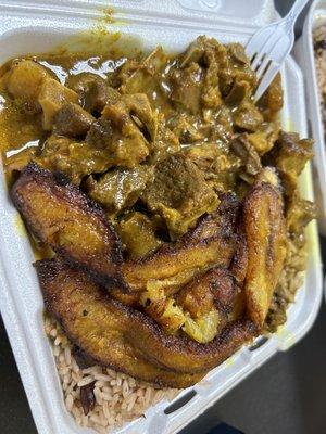 Goat stew with plantains and rice