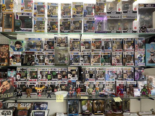 Funko Pop figures, action figures, and superhero figures.