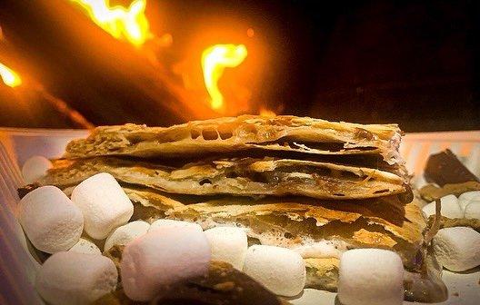 "S'more of what?"
S'mores quesadilla! Classic ingredients, classic mess, sit by the fire and share ghost stories.