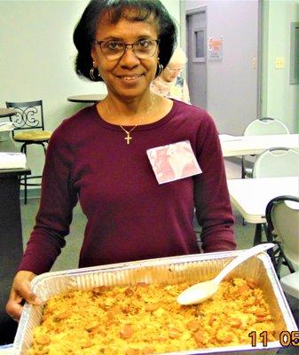 Our meal coordinator serving a donated meal.