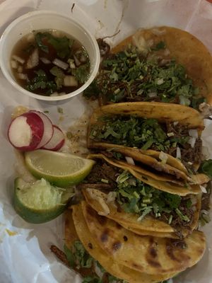 Birria tacos with consome