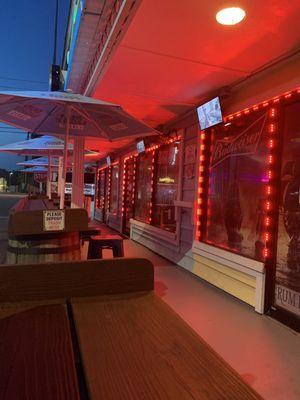 Outside porch with tvs