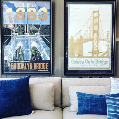 Bridge poster art, indigo pillows, and custom sofa.