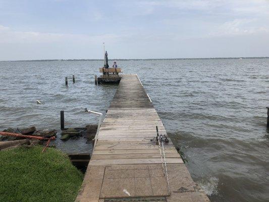 Kids fishing off the dock.