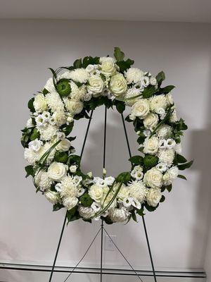 Find solace with our White & Green Tribute Wreath. Elegant, timeless, and perfect for honoring cherished memories. #LastingSerenity