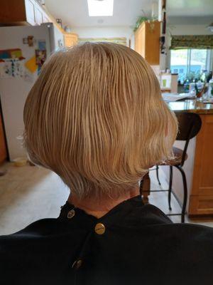 Layered Bob Cut with a slight stack in back.