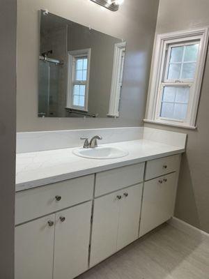 Relocate new vanity, cabinet, sink, faucet, light and mirror