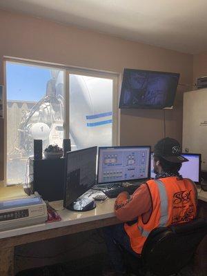 Our dispatcher loading up a truck for a concrete delivery