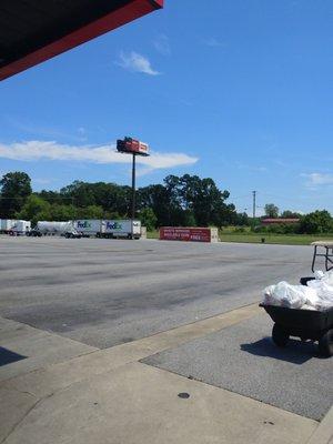 Nice blue sky Day hot Interstate 20 in the background and now they have the on-site & shop services for those that need them