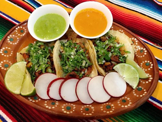 Al Pastor Tacos Choice of green or red hot sauce