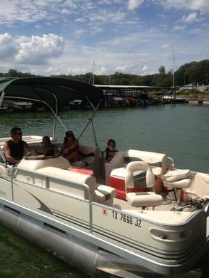 A family renting out our pontoon boat!