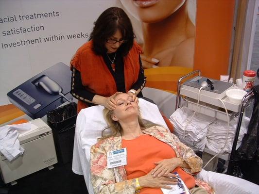 Performing HLE treatment at Las Vegas trade show.