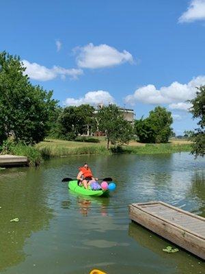 Rick put balloons on my kayak for my birthday celebration!