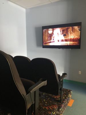 Movie room with theater seating