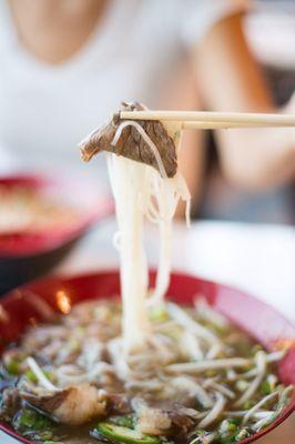 Beef noodle soup with eye round steak, well done brisket, well done chuck roast, and tendon