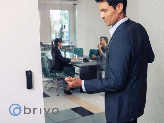 Example of a Brivo access control device being used to gain access to an office space