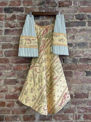 Beautiful handmade reversible apron and dish towel set made from vintage tablecloth. Unique and one of a kind gift for that special someone.