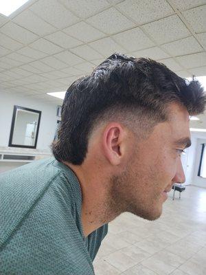 Burst fade Mohawk.