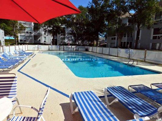 Condo overlooks pool area