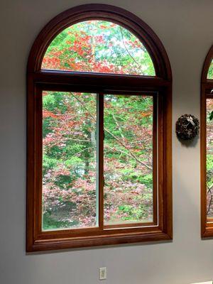 These are the new windows with the trim stain to match original step stained trim