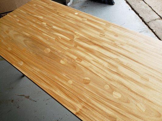 Whimsical inlays in a Eucalyptus table top