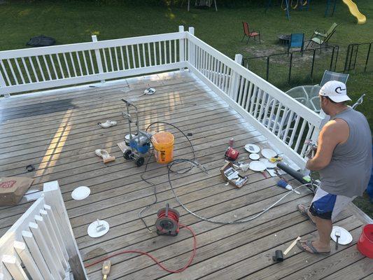 Deck railings being painted